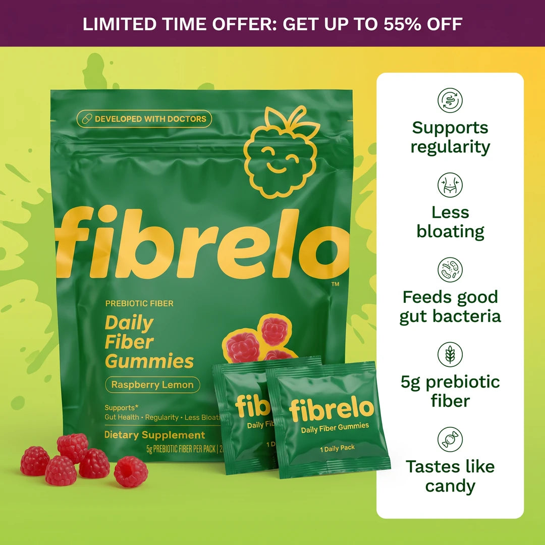 Green Fibrelo Superfoods Greens Gummies package featuring the Shrek logo and character, labeled Berry Far Far Away flavor, listing support for gut health, energy, immunity, recovery, beauty, and cognition, Dietary Supplement, 28 Daily Packs, on a green-to-purple gradient background.